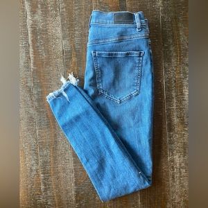 Never worn high rise skinny express jeans size 6 R with raw hem